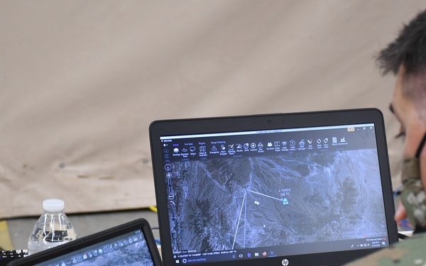 Solider monitors air and ground position location information (PLI) on the Windows Tactical Assault Kit (WINTAK) and Android Tactical Assault Kit (ATAK) to get a common operating picture that enhances situational awareness and data sharing.