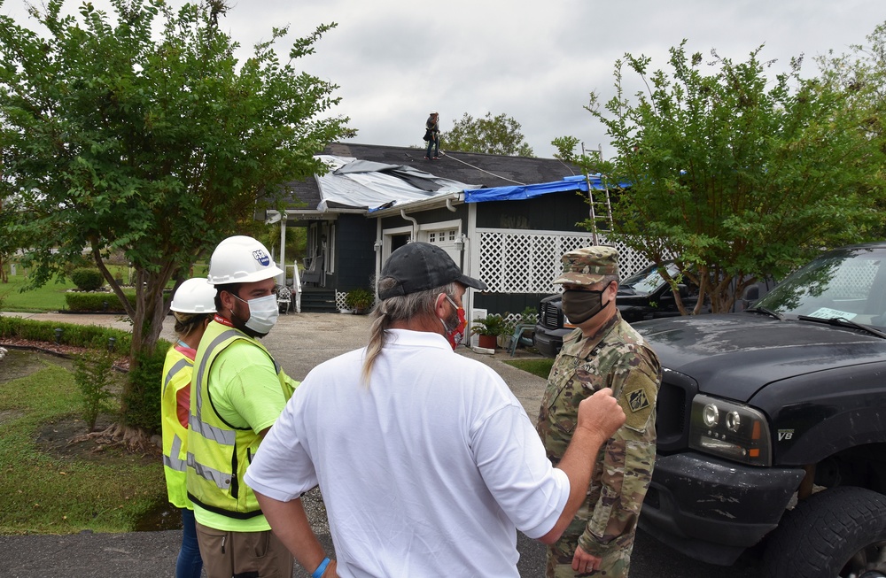 Commander checks in on Blue Roof installation