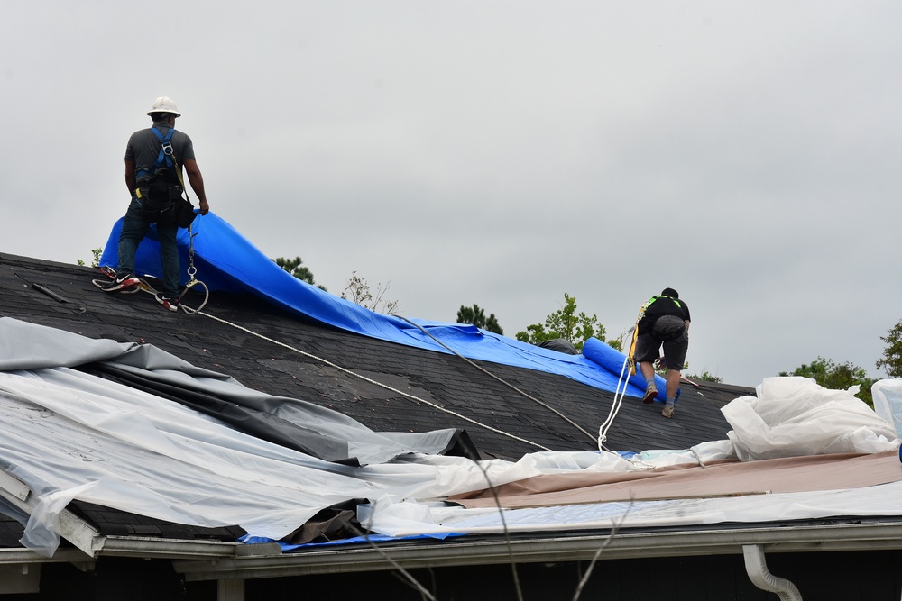 Commander checks in on Blue Roof installation