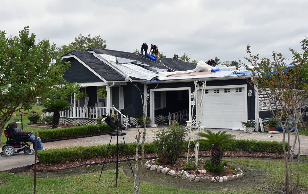 Commander checks in on Blue Roof installation