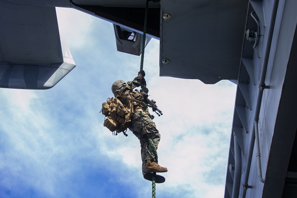 DVIDS - Images - BLT 2/4 Marines fast rope aboard USS America [Image 6 ...