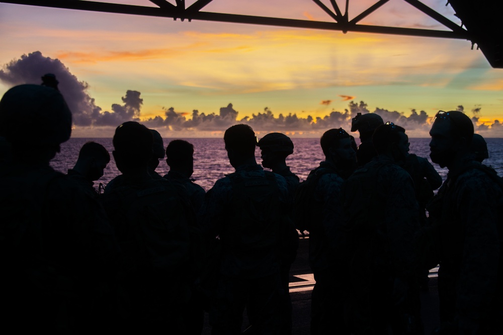 Marines and Sailors Fast Rope aboard USS America