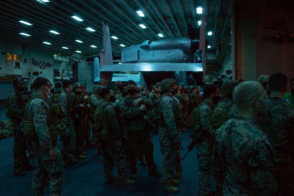 Marines and Sailors Fast Rope aboard USS America