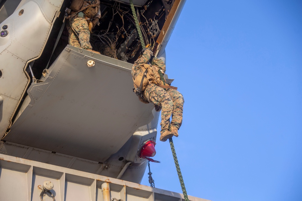 Marines and Sailors Fast Rope aboard USS America