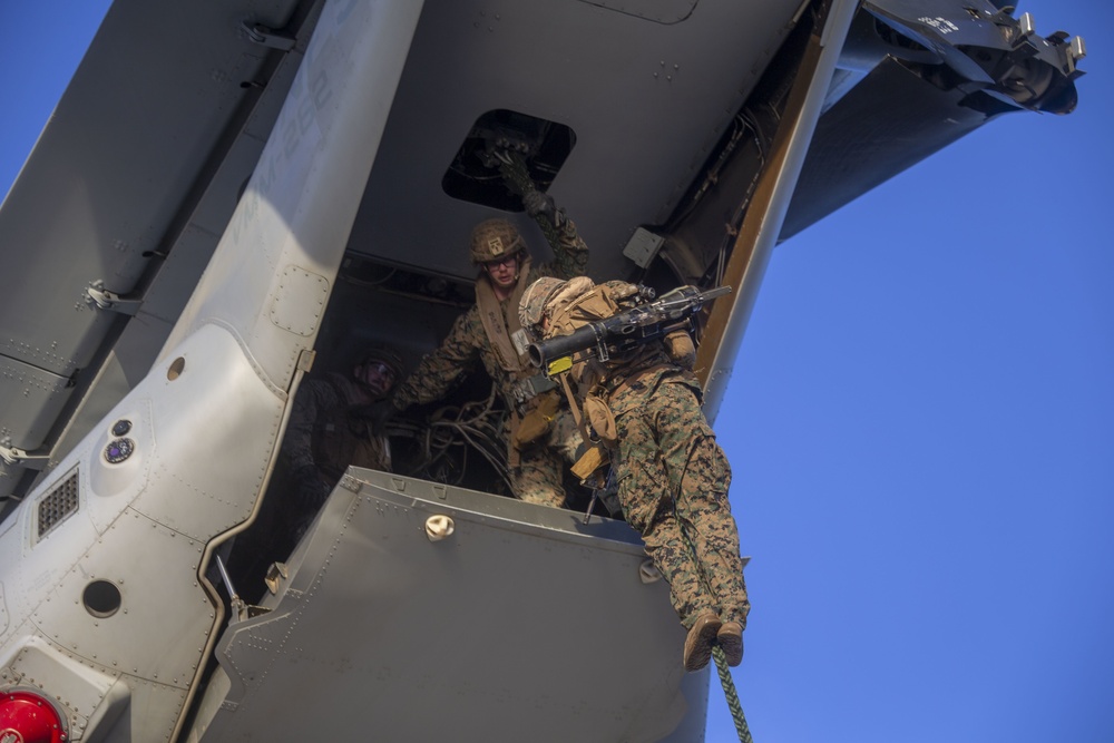 Marines and Sailors Fast Rope aboard USS America