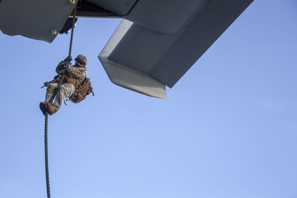 Marines and Sailors Fast Rope aboard USS America