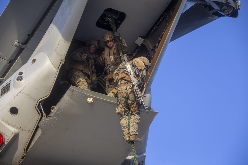 Marines and Sailors Fast Rope aboard USS America