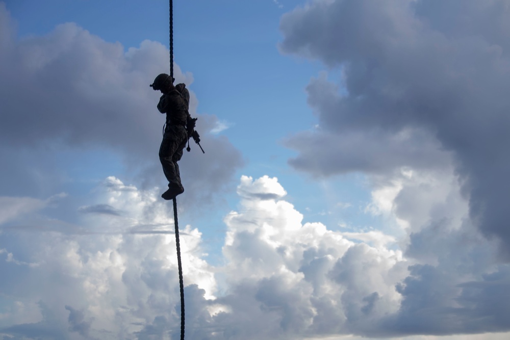 Marines and Sailors Fast Rope aboard USS America