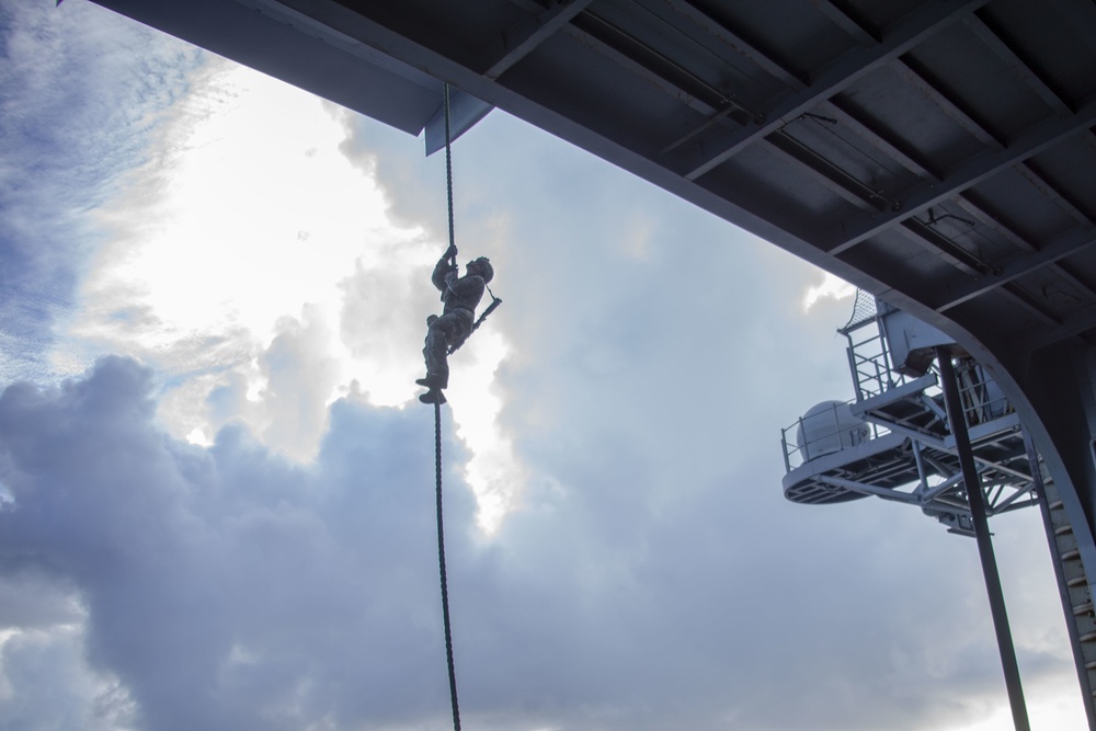 Marines and Sailors Fast Rope aboard USS America