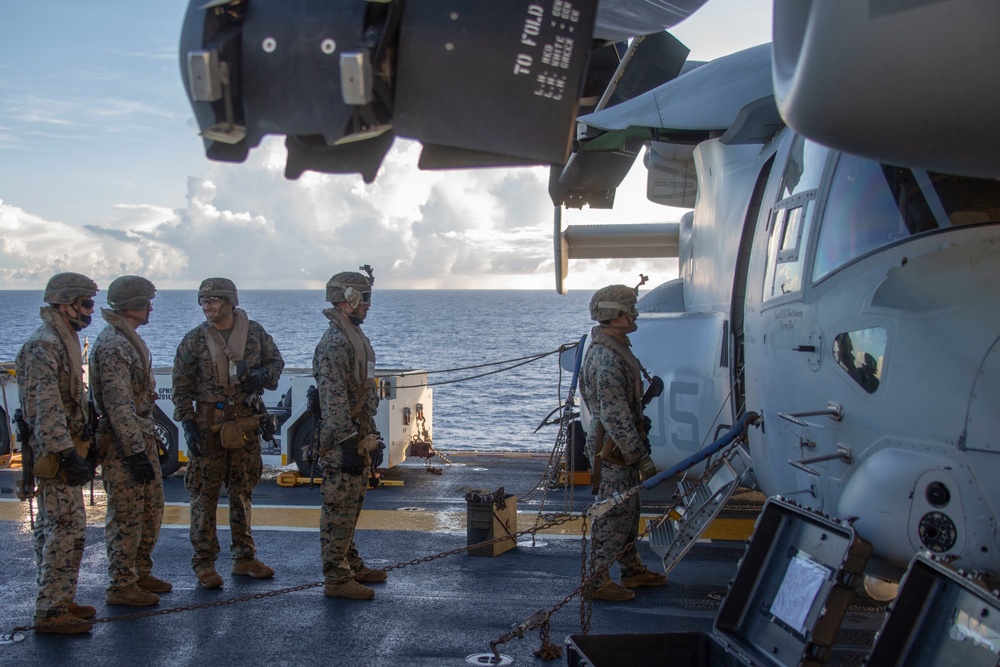 Marines and Sailors Fast Rope aboard USS America