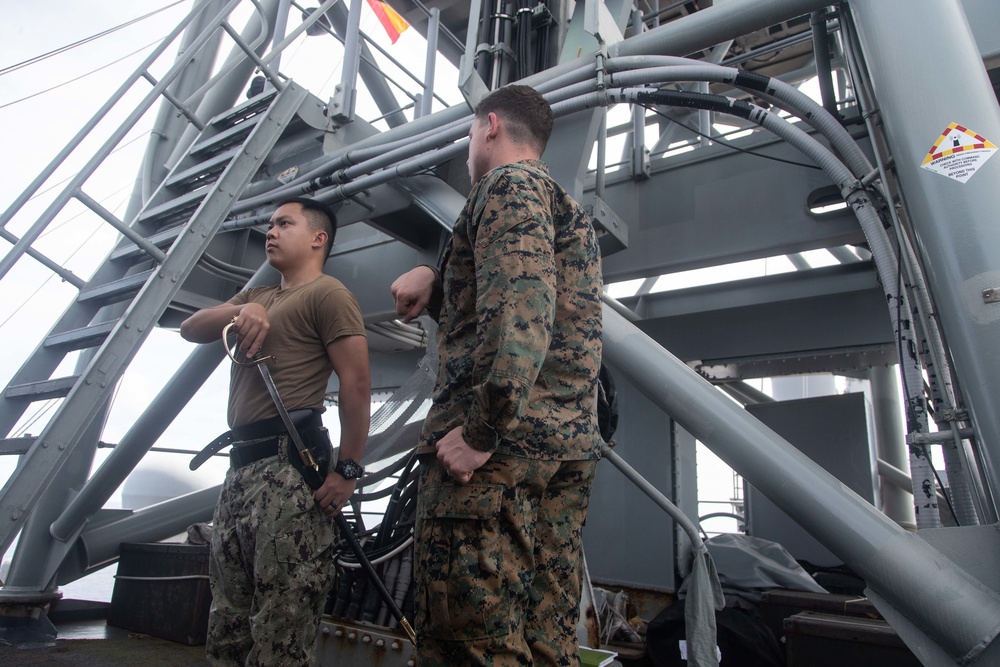Marines practice sword and guidon manual during Cpl's Course