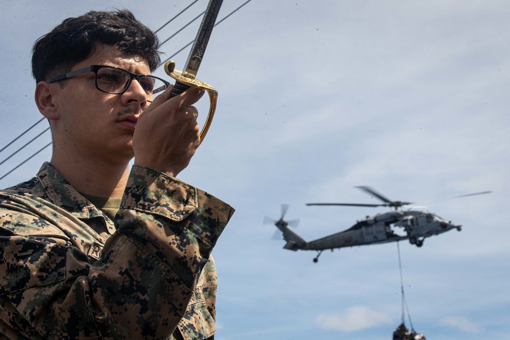 Marines practice sword and guidon manual during Cpl's Course