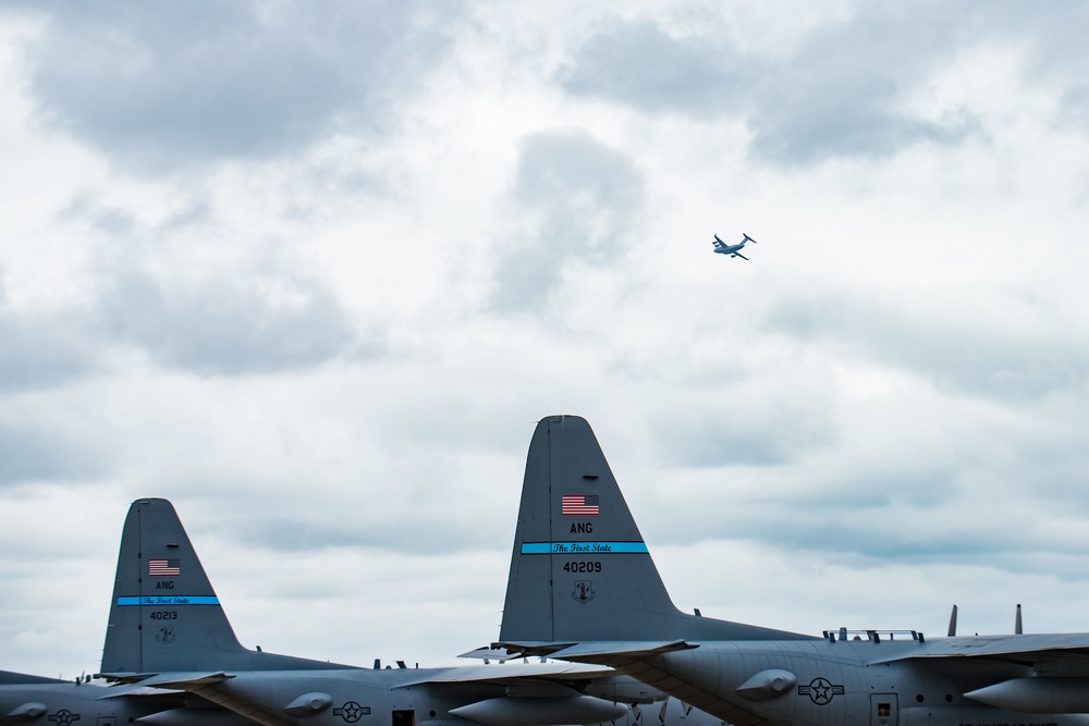 A C-17 Globemaster III from Dover Air Force Base flies over New Castle Air National Guard Base, Del.
