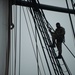 Sailors climb the shrouds aboard USS Constitution