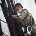 Sailors climb the shrouds aboard USS Constitution