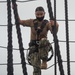 Sailors climb the shrouds aboard USS Constitution