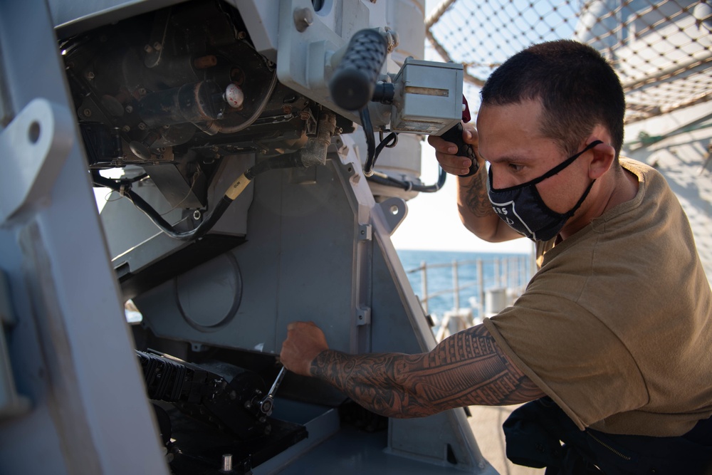 USS Princeton Sailor conducts routine maintenance