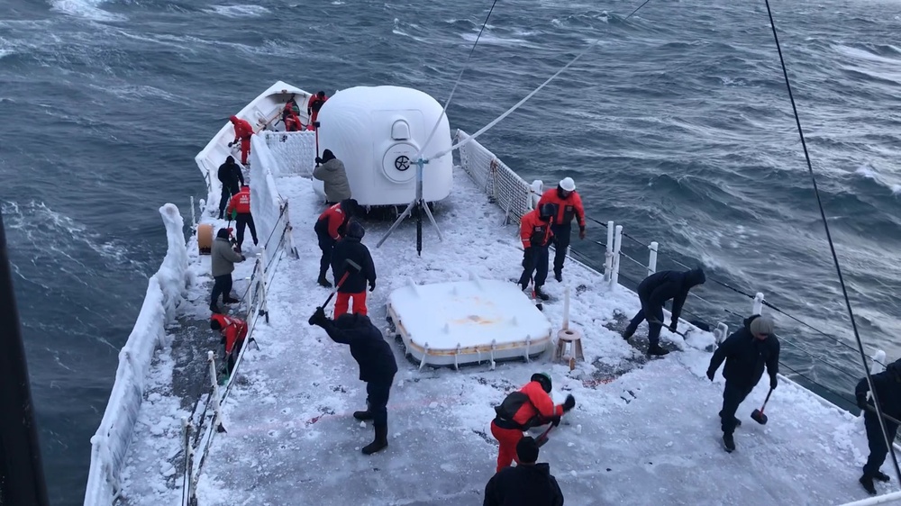 Coast Guard crew breaks ice on deck