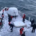 Coast Guard crew breaks ice on deck