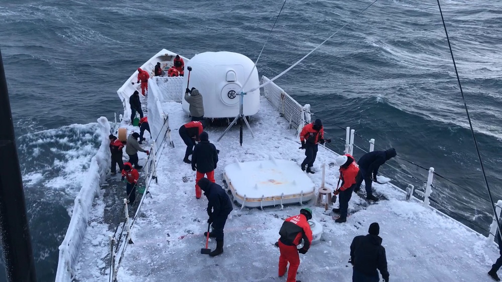 Coast Guard crew breaks ice on deck