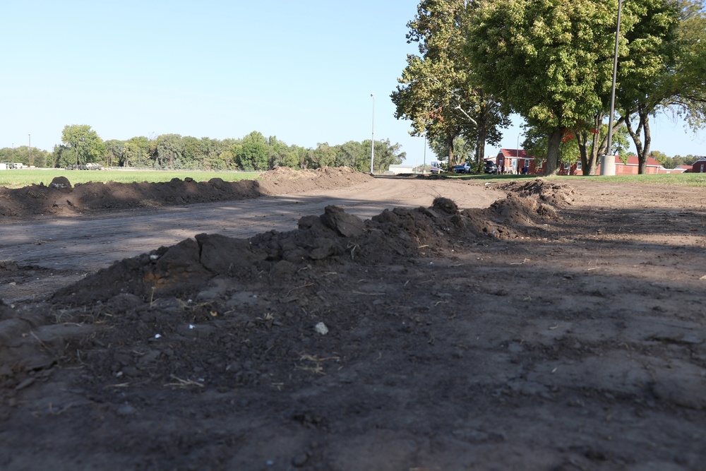 Mounds of dirt are pushed up on the future track field
