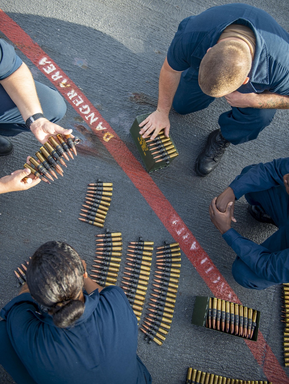 John Paul Jones Sailors prepare for a gun shoot