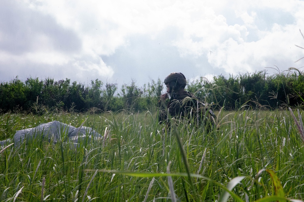 Extending the range: Marines secure martime terrain, deploy rocket system.