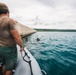 Navy Seabee Divers Inspect Pier in CNMI