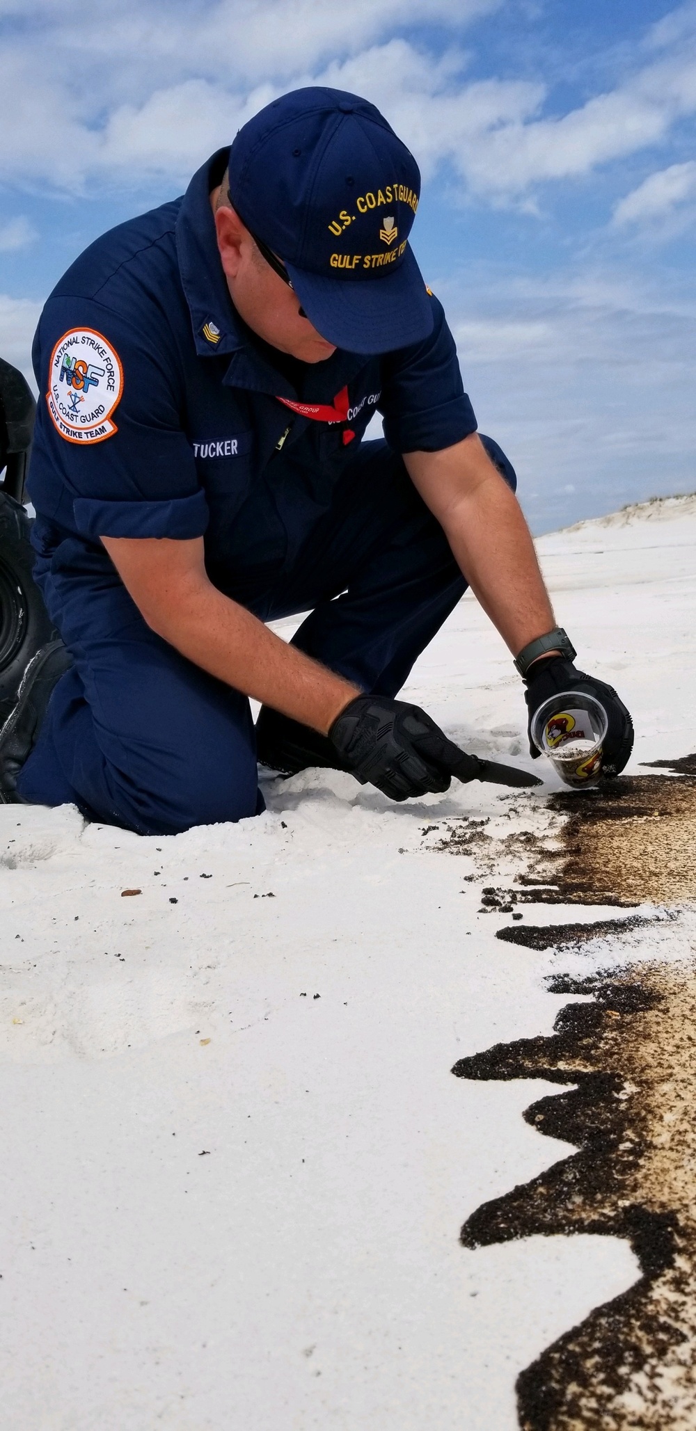 Coast Guard gathers oil samples on Johnson Beach, Florida