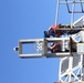 Coast Guard aids to navigation crew members repair navigation lights in Mobile, Alabama Channel