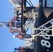 Coast Guard aids to navigation crew members repair navigation lights in Mobile, Alabama Channel