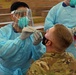 NMRTC-PH Sailor conducts COVID-19 swab procedure on U.S. Army Soldier in Hawaii