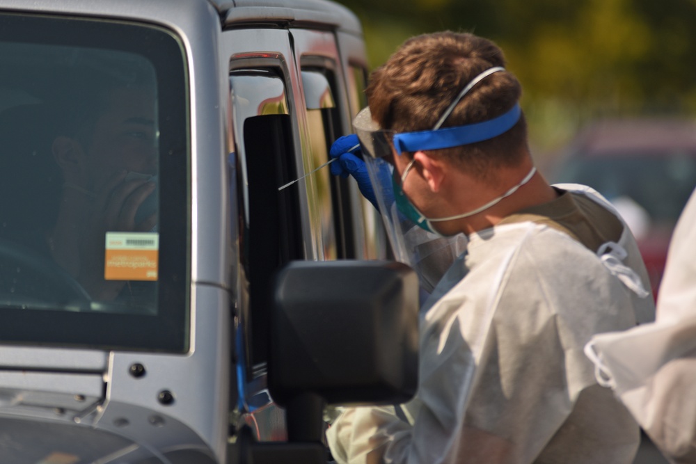 Michigan National Guard soldiers work side-by-side with members of the Wayne County Health Department