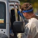 Michigan National Guard soldiers work side-by-side with members of the Wayne County Health Department