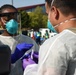 Michigan National Guard soldiers work side-by-side with members of the Wayne County Health Department