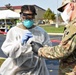 Michigan National Guard soldiers work side-by-side with members of the Wayne County Health Department
