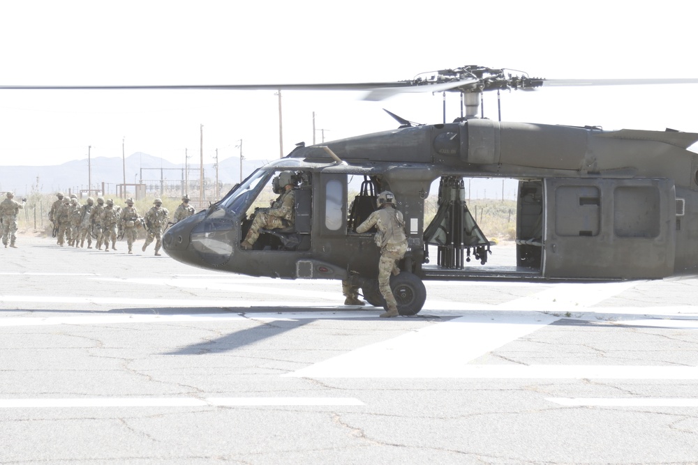 Dvids - Images - 1-113th Soldiers Move By Blackhawk [image 6 Of 17]