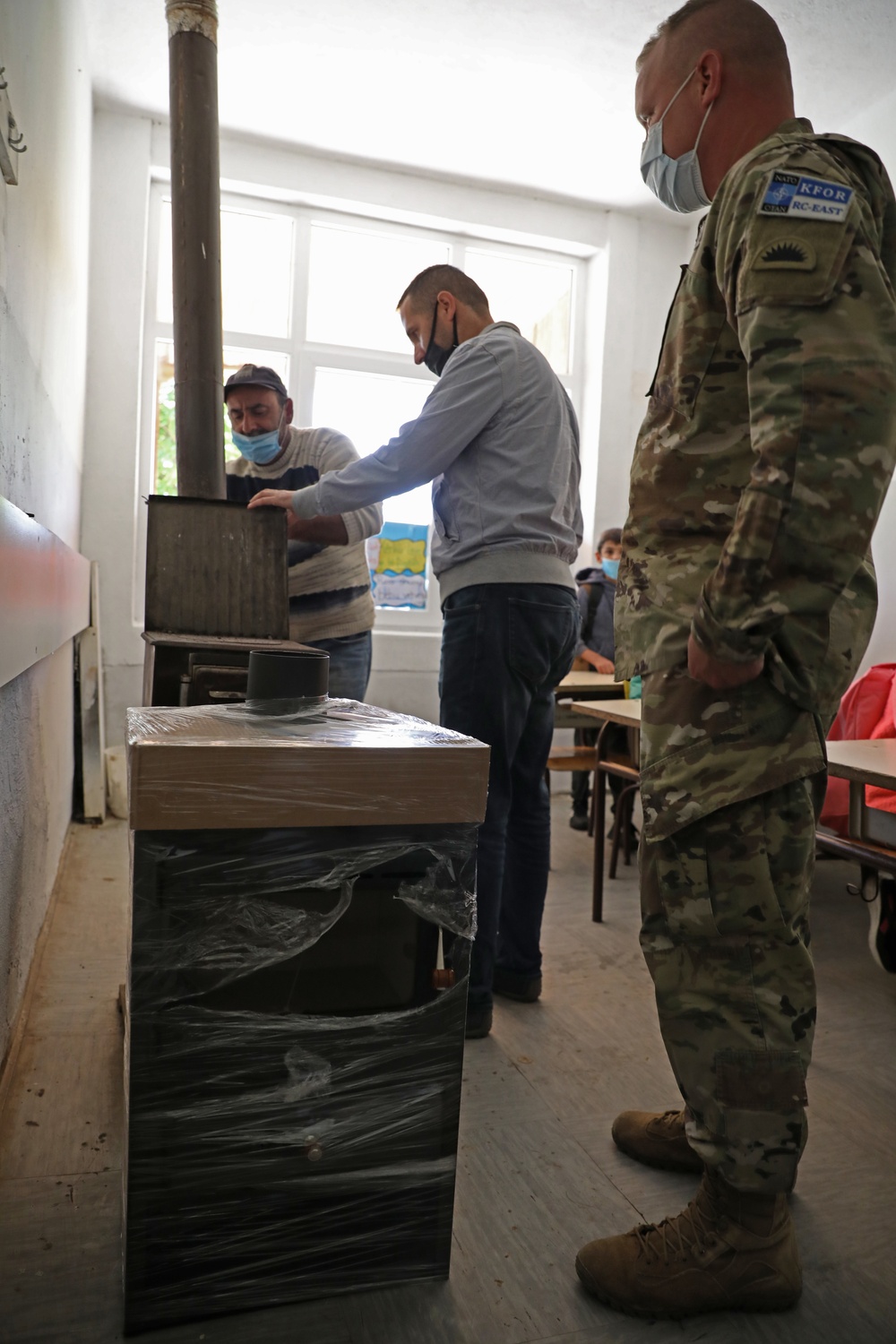 KFOR RC-E Soldiers donate stoves to Kosovo schools