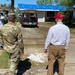 MVD deputy commander views blue roof installing during Hurricane Laura response visit