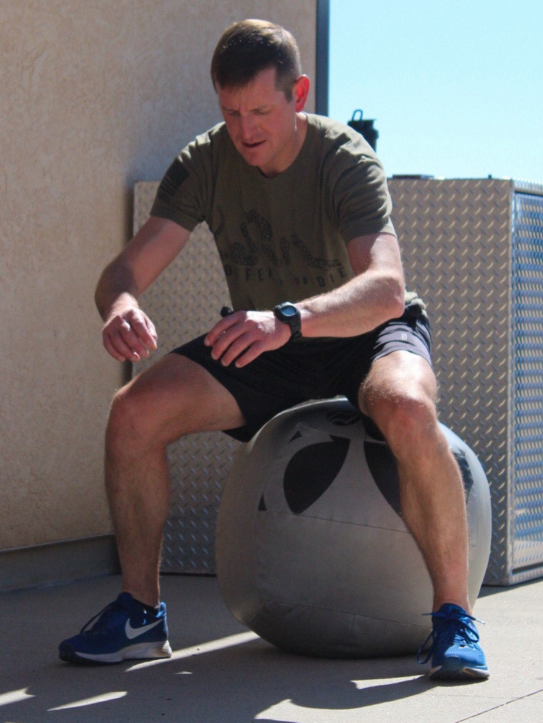 Airmen test fitness during dry triathlon