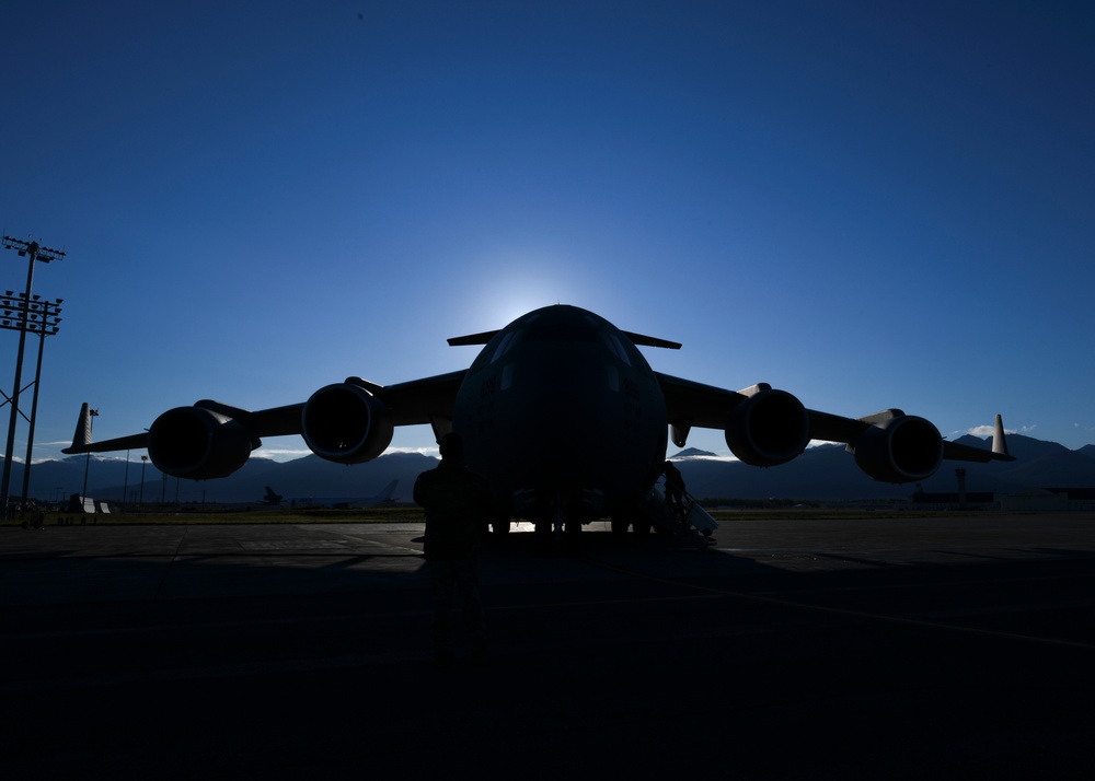 A C-17 Globemaster III aircraft staged for takeoff at Joint Base Elmendorf-Richardson, A.K.