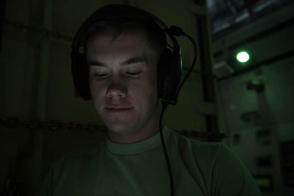 A1C Camron Palmer conducts qualification training on a CONNEX on a C-17