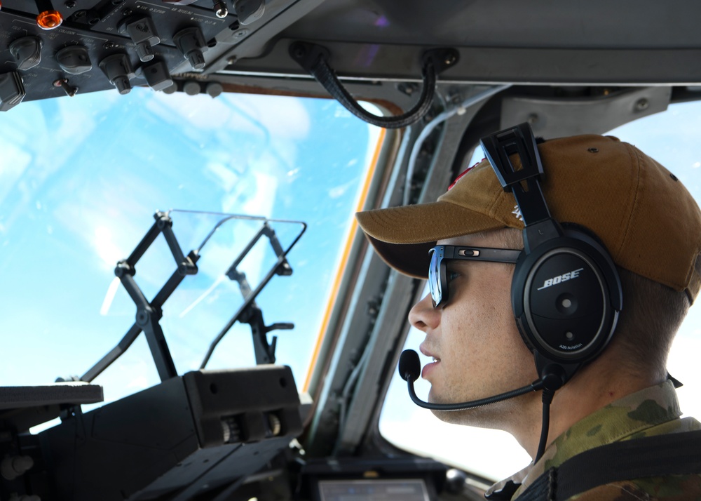 Capt. Ross Wiginton conducts a low level flight over AB, Guam