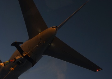 A KC-46 Pegasus aircraft conducts air-to-air refuel operations with a C-17 Globemaster III