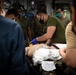 U.S. Marines and Sailors with the 31st MEU and USS America participate in a Mass Casualty Drill