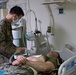 U.S. Marines and Sailors with the 31st MEU and USS America participate in a Mass Casualty Drill