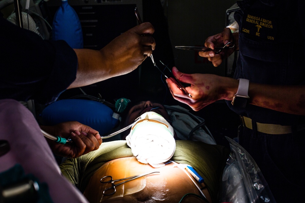 U.S. Marines and Sailors with the 31st MEU and USS America participate in a Mass Casualty Drill
