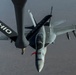 Tankers refuel Navy fighter jets