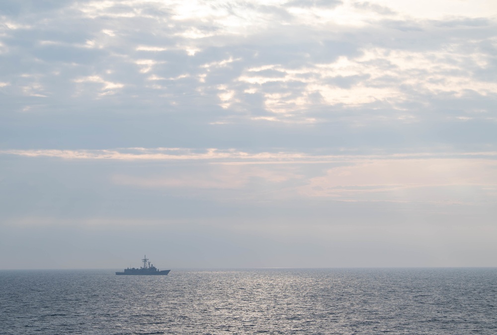 USS Ross (DDG 71) completes passing exercise with Polish Navy.