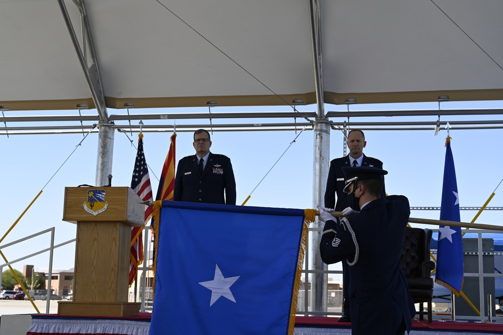 Wing honors commander's promotion at unique ceremony